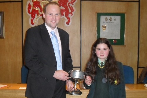 Teresa McKinley is congratulated by SWaMP Chairman Councillor Connaire McGreevy